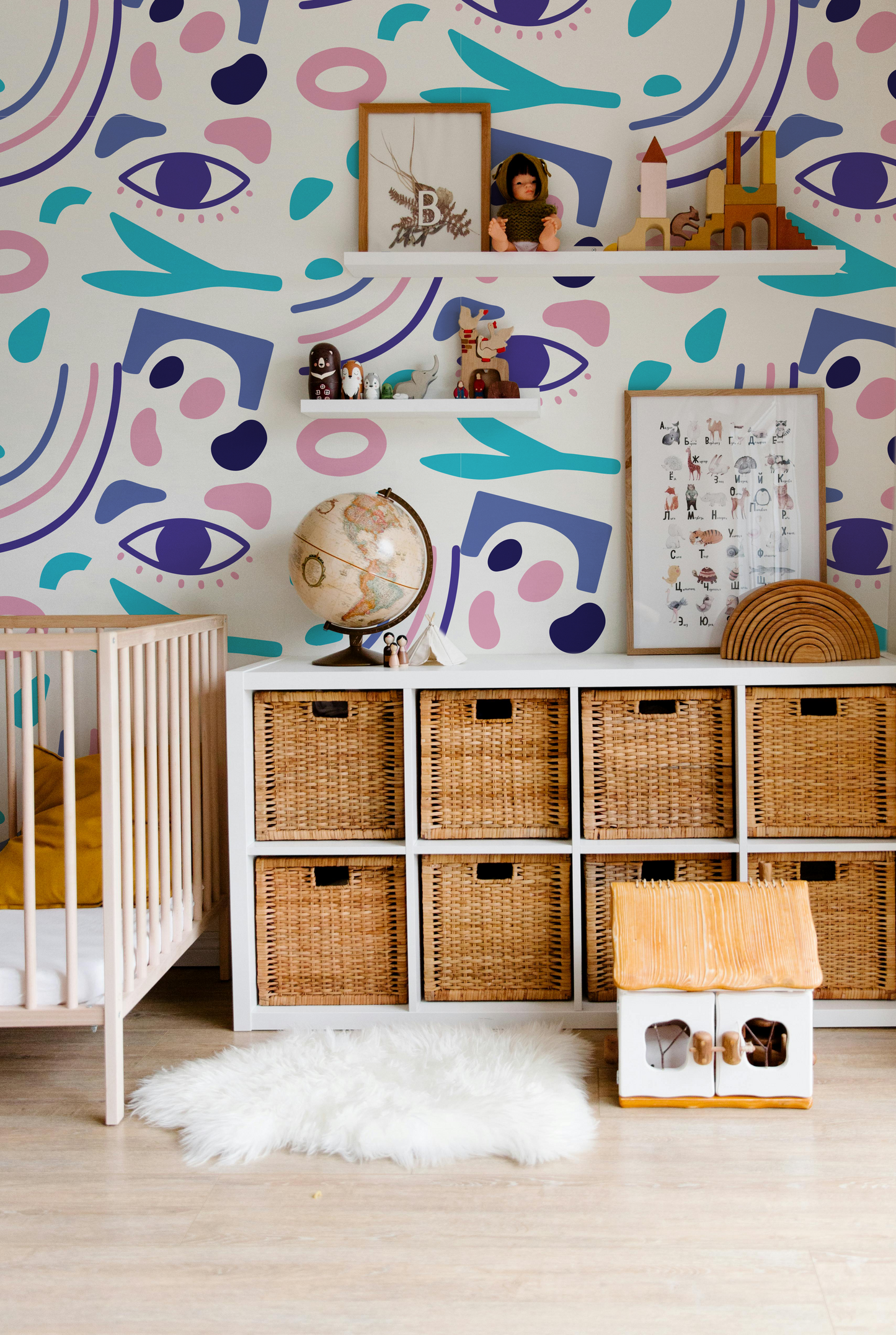 Luma Vision colorful abstract kids wallpaper with playful eyes and geometric shapes in a modern nursery