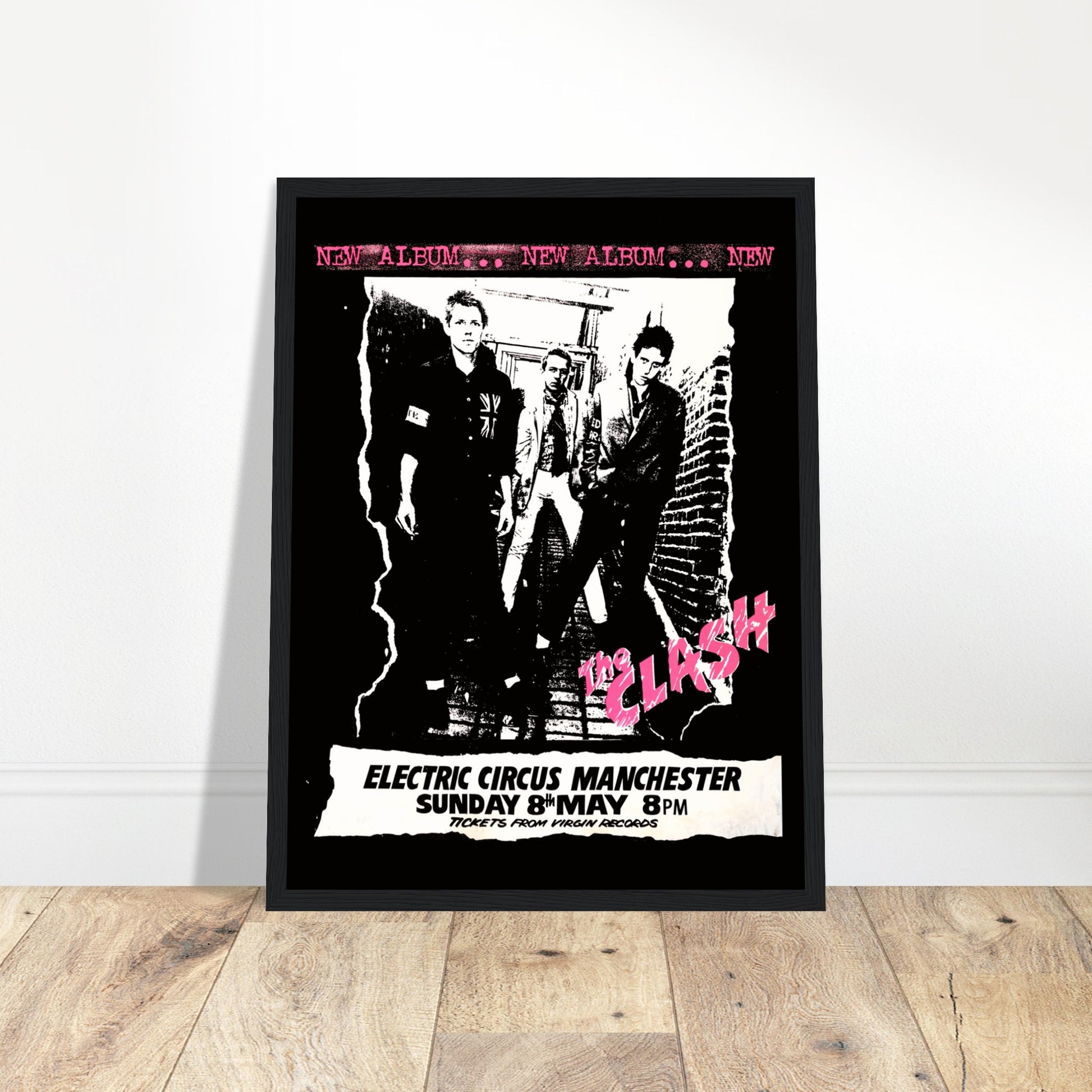 Vintage The Clash concert poster from Electric Circus Manchester featuring punk rock design and bold black-and-pink typography.