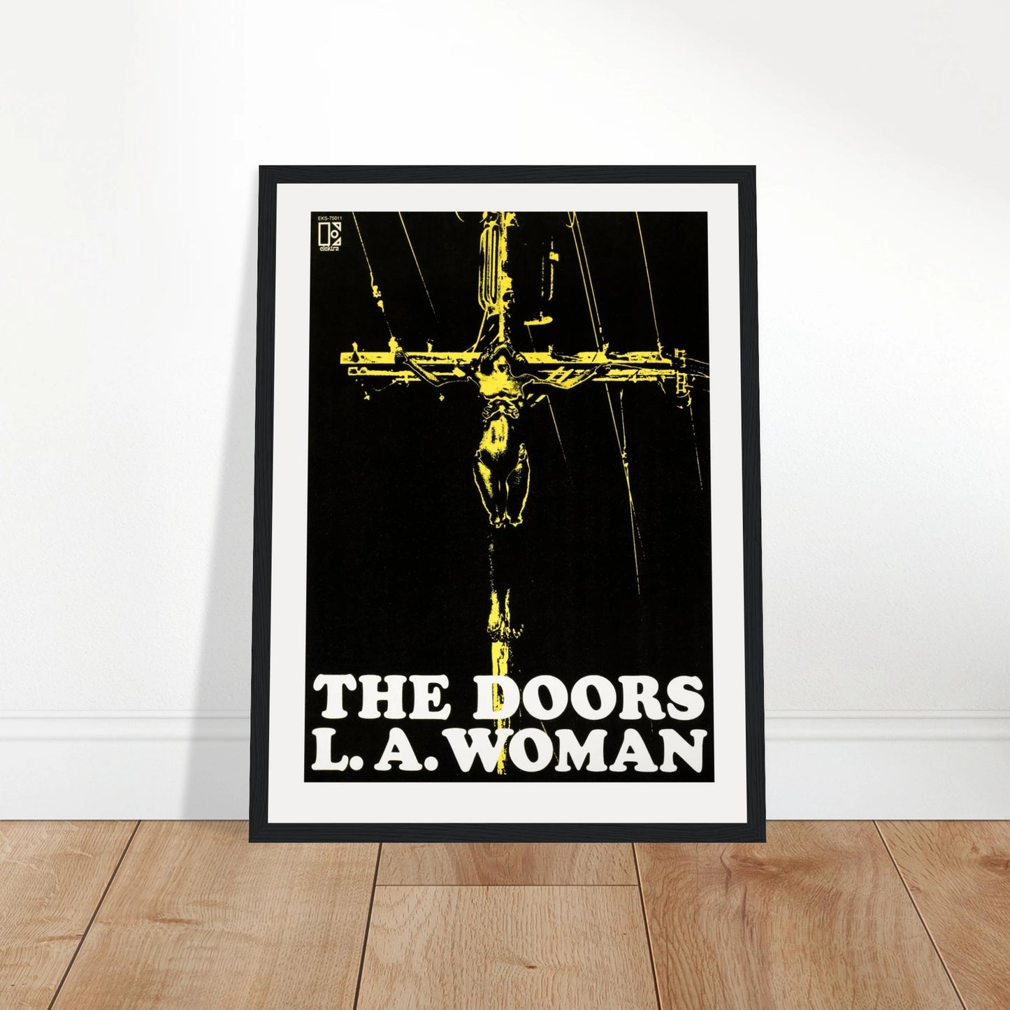 Celebrate one of rock’s most iconic albums with this vintage-style poster of The Doors' L.A. Woman. Featuring the legendary album cover design, this print captures the gritty, raw energy of Jim Morrison’s final studio recording with the band. The bold colors, classic typography, and unmistakable mood of L.A. Woman make this poster a powerful piece of rock history and visual culture. Ideal for music rooms, studio walls, or any classic rock collection, this high-quality print brings a touch of rebellious 70s