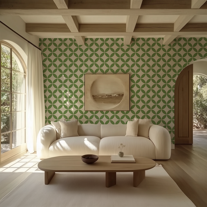 Green mid-century geometric wallpaper styled in a warm living room with natural wood