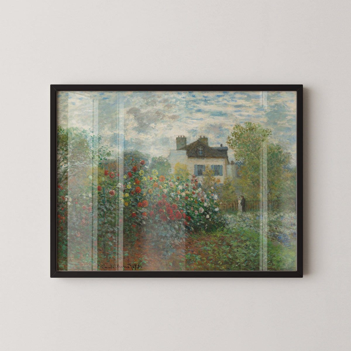 The Artist's Garden in Argenteuil by Claude Monet shown in a black frame