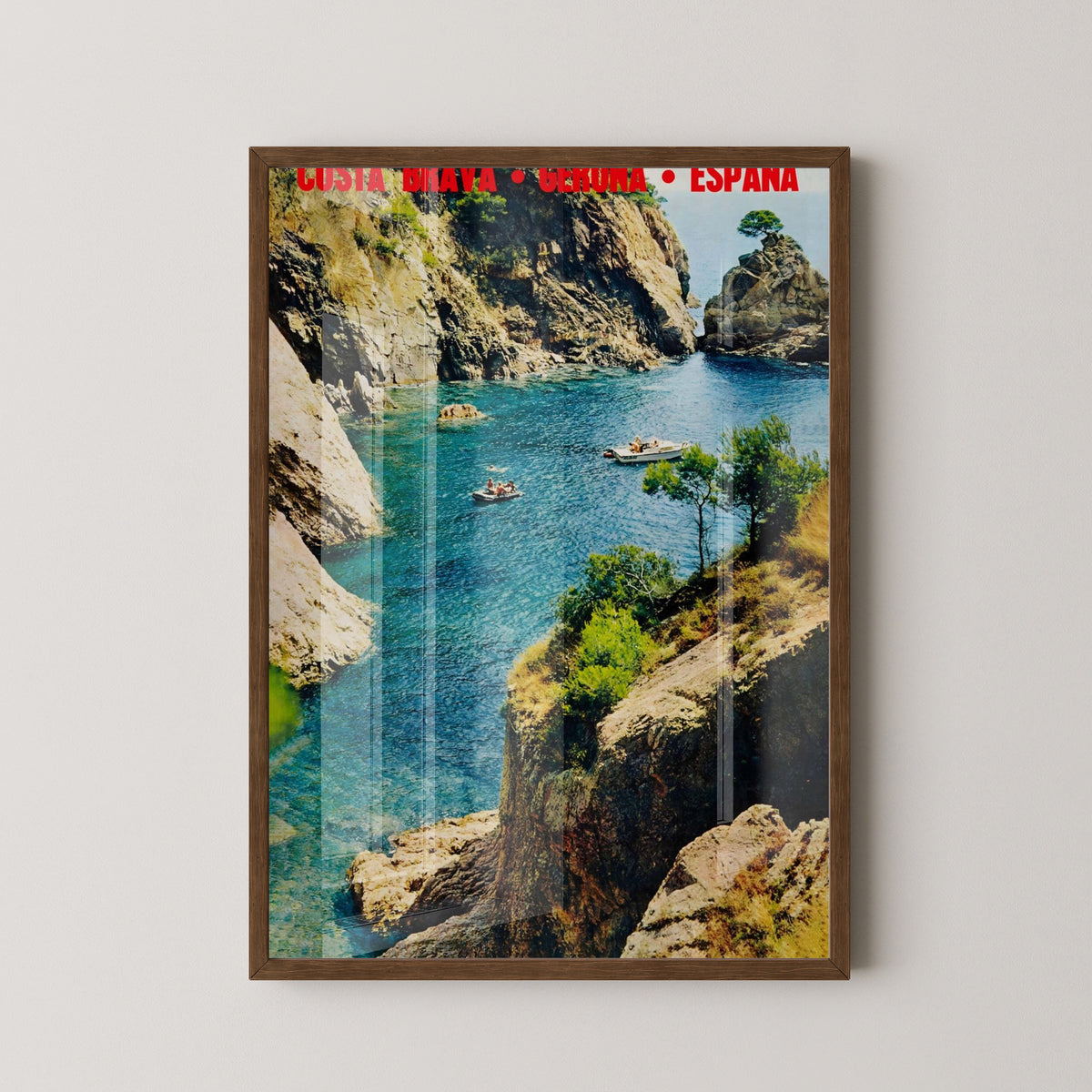 Costa Brava Vintage Coastal Travel Poster – dark wood frame mockup