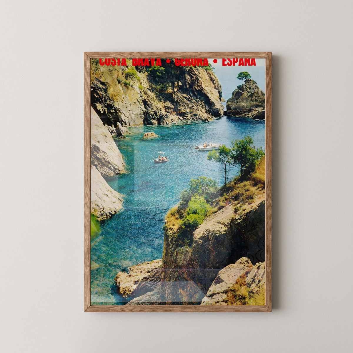 Costa Brava Vintage Coastal Travel Poster – light wood frame mockup