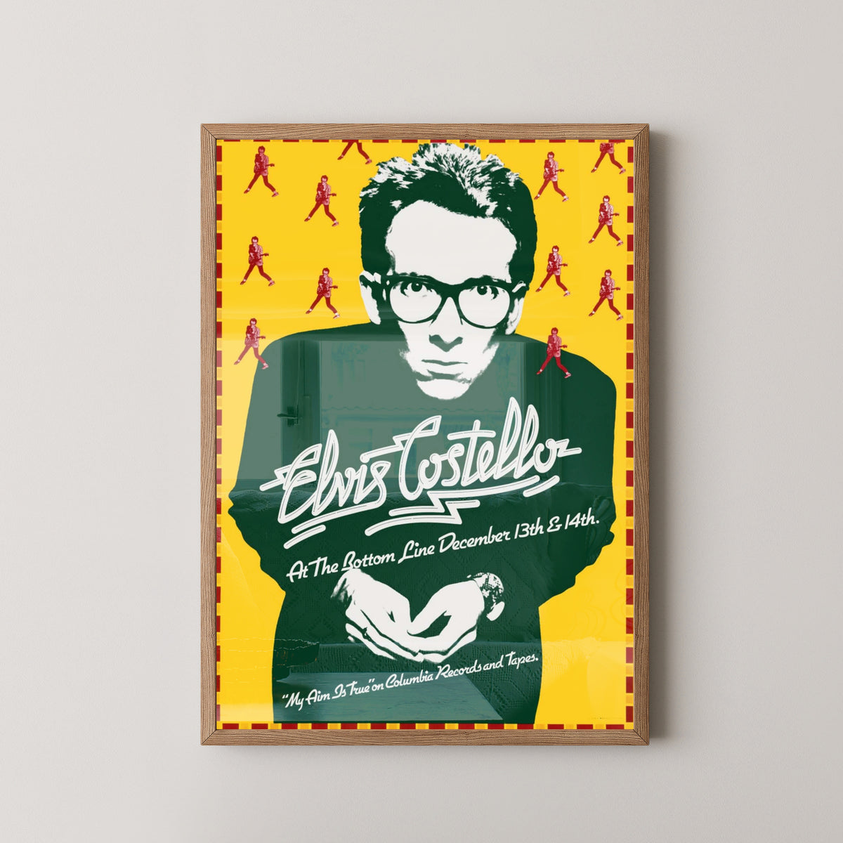 Elvis Costello Concert Poster – New Wave Rock Art – light wood frame mockup