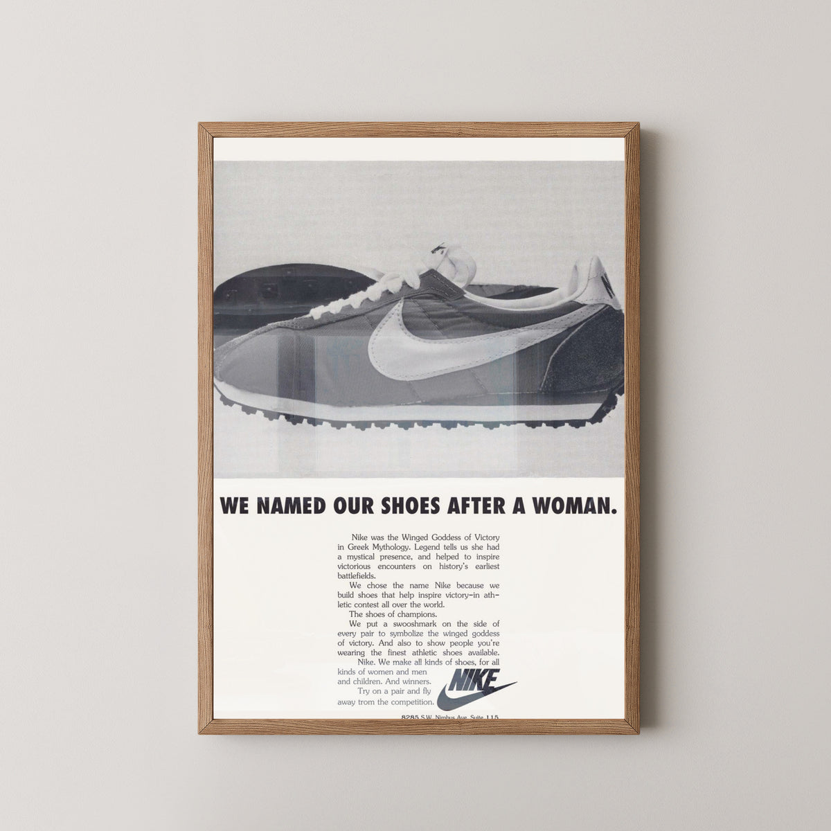 Nike Women Vintage Advertisement Poster – light wood frame mockup