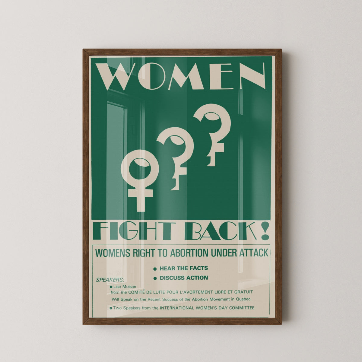 Women Fight Back Poster – 1970s Feminist Protest Art – dark wood frame mockup