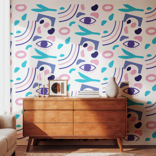 Luma Vision colorful abstract art wallpaper with geometric shapes and illustrated eyes in a modern living room