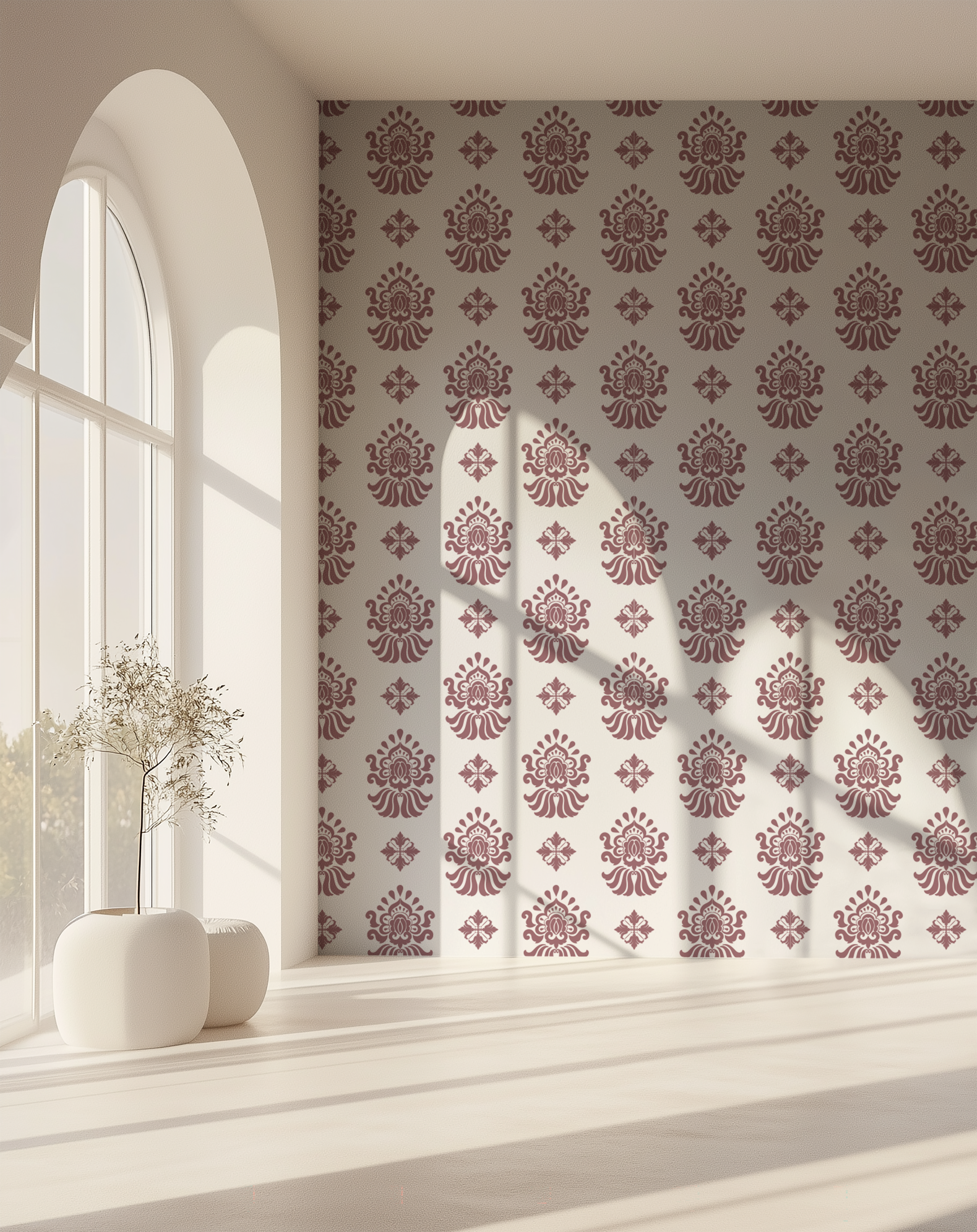 Dusty pink and cream ornamental wallpaper with a repeating vintage floral motif