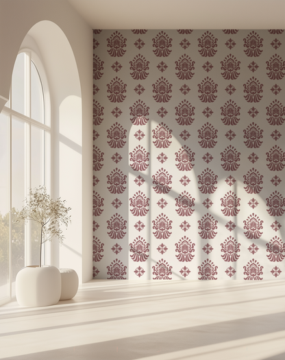 Dusty pink and cream ornamental wallpaper with a repeating vintage floral motif