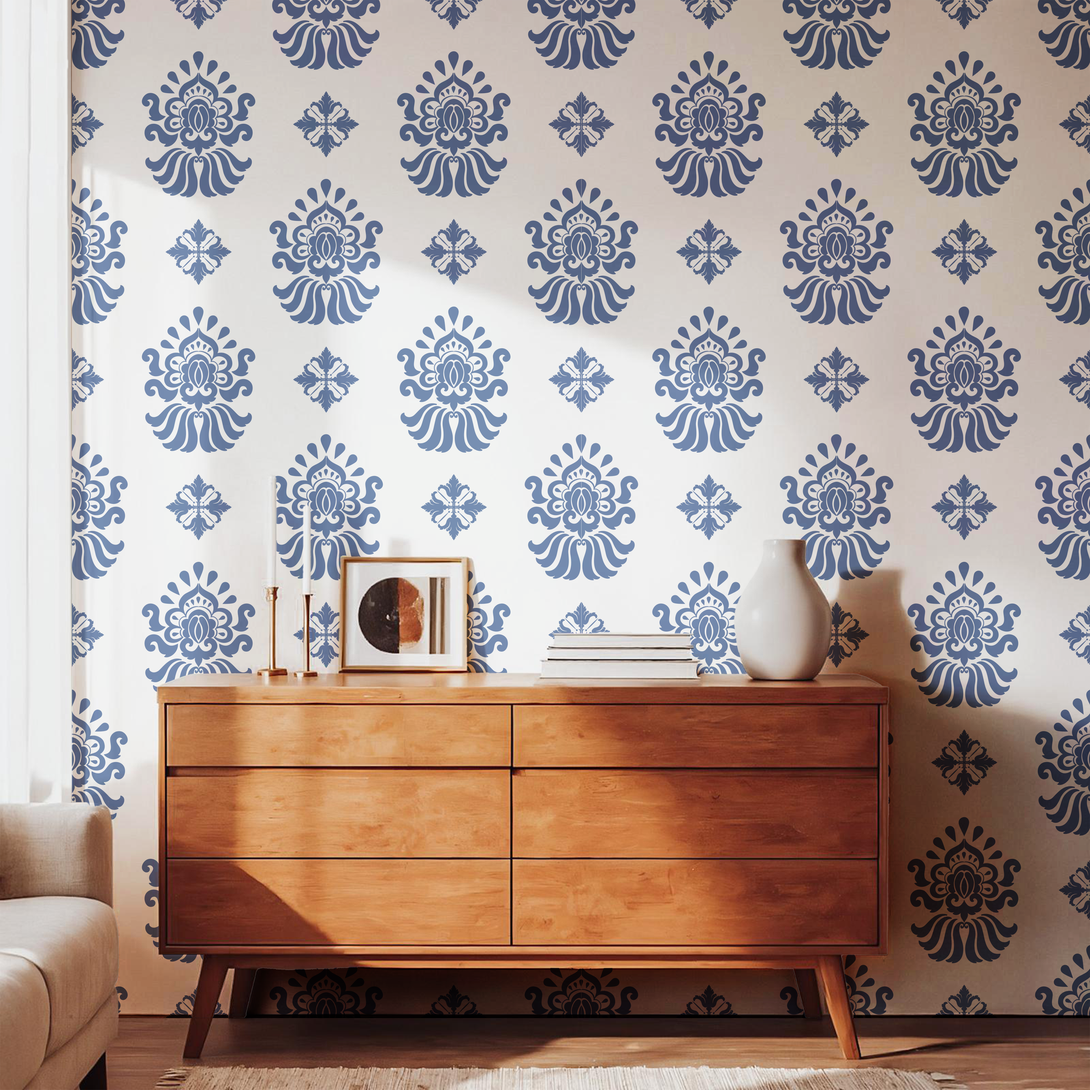 Navy blue vintage ornamental wallpaper styled with a mid-century wooden dresser