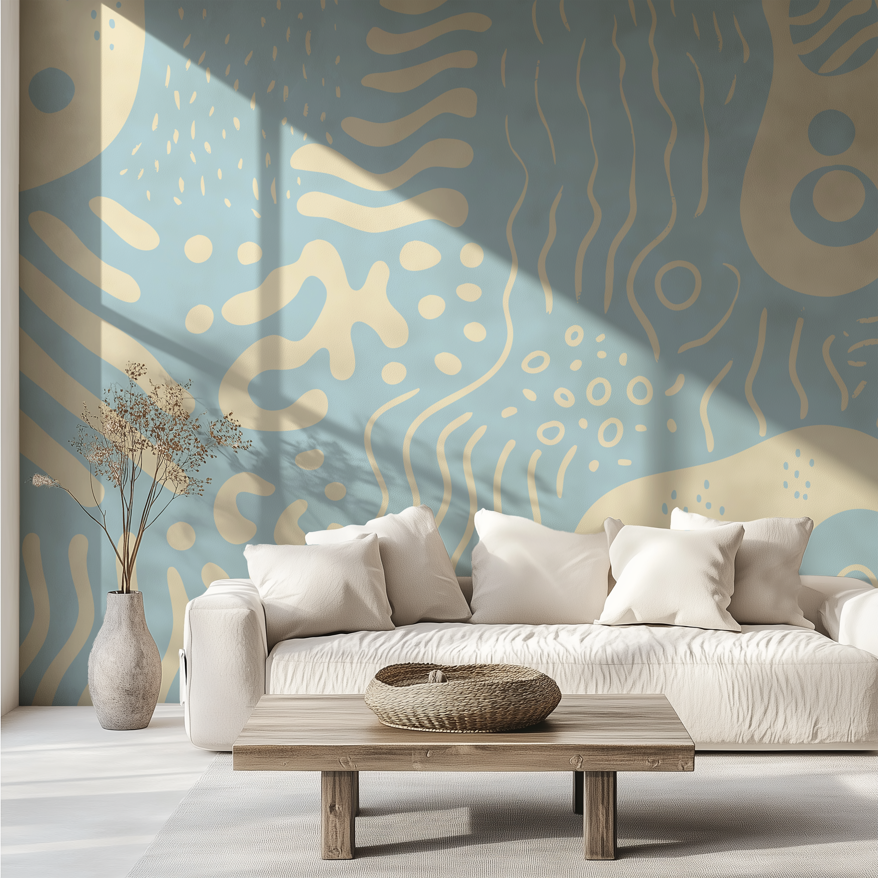 Minimalist bedroom featuring Marea Sky blue and beige organic wallpaper as a bold headboard feature wall.