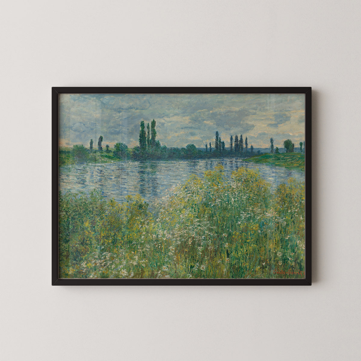 Banks of the Seine, Vétheuil by Claude Monet art print in a black frame, showing Seine riverbank and wildflowers