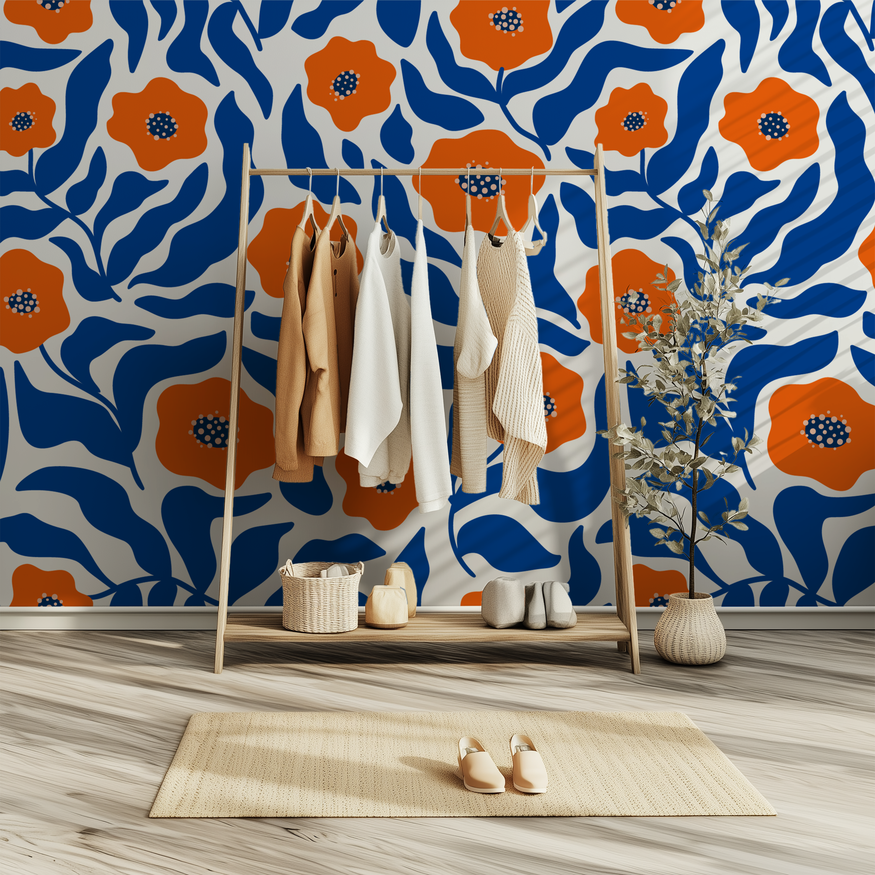 Bold orange flower wallpaper with deep blue leaves on a cream background