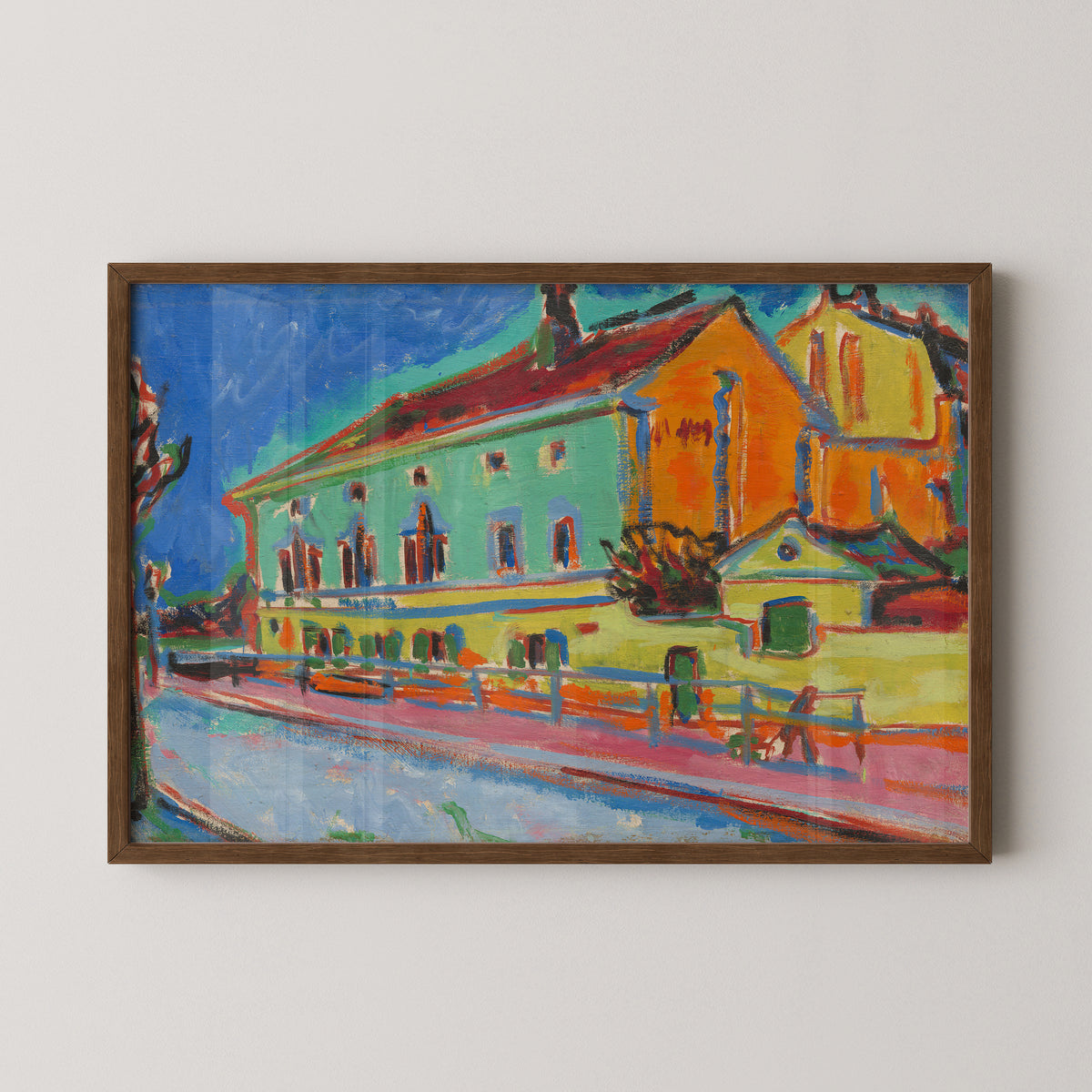Dance Hall Bellevue by Ernst Ludwig Kirchner art print in a dark wood frame, with colorful waterfront building and boats
