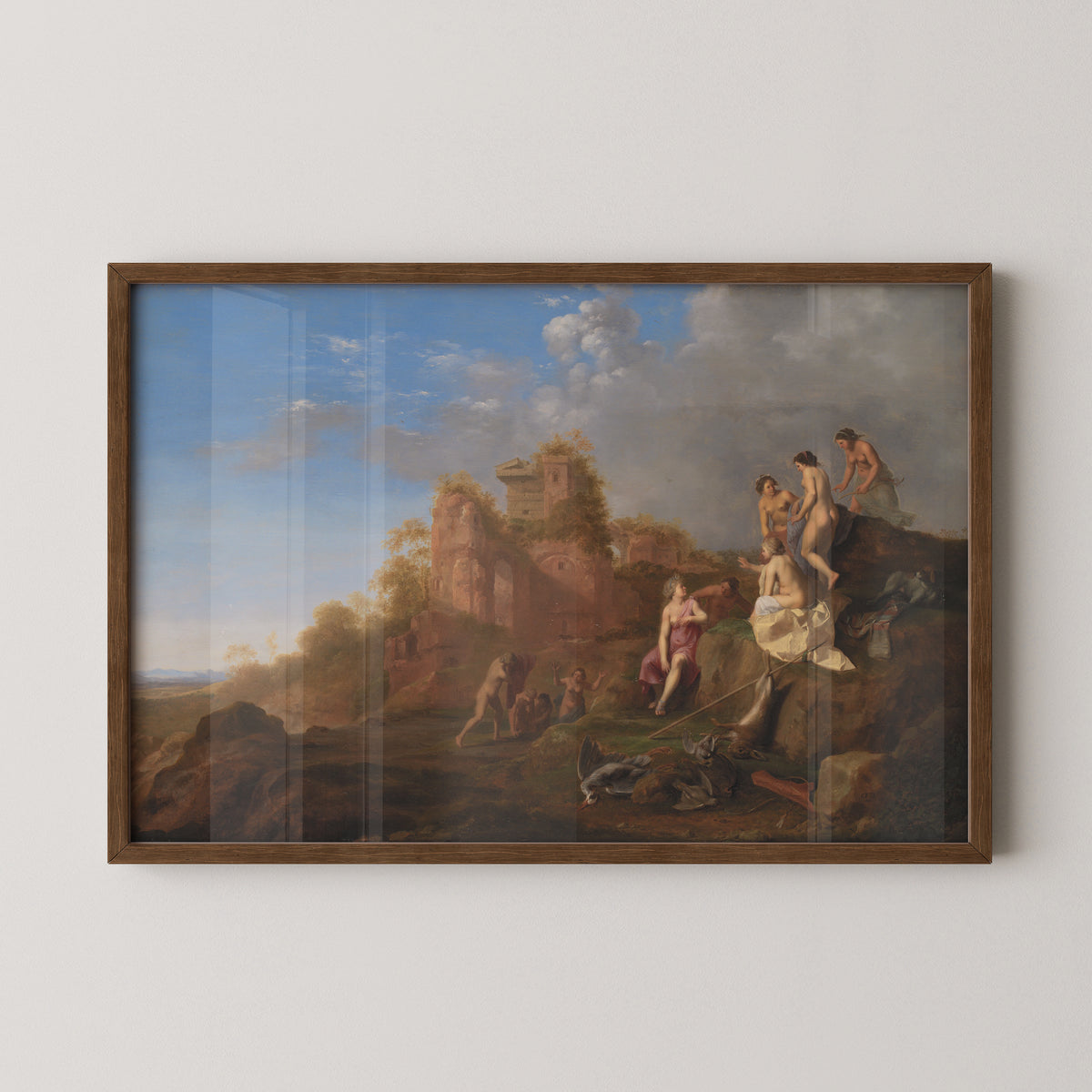 Poelenburch's Diana and Her Nymphs art print displayed in a dark wood frame
