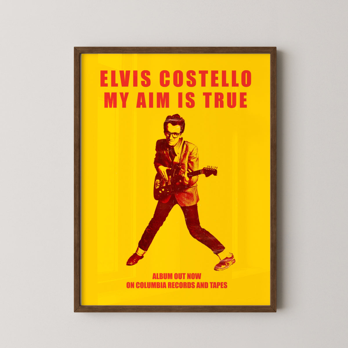 Elvis Costello Vintage Poster – New Wave Music Art – darkwood frame mockup