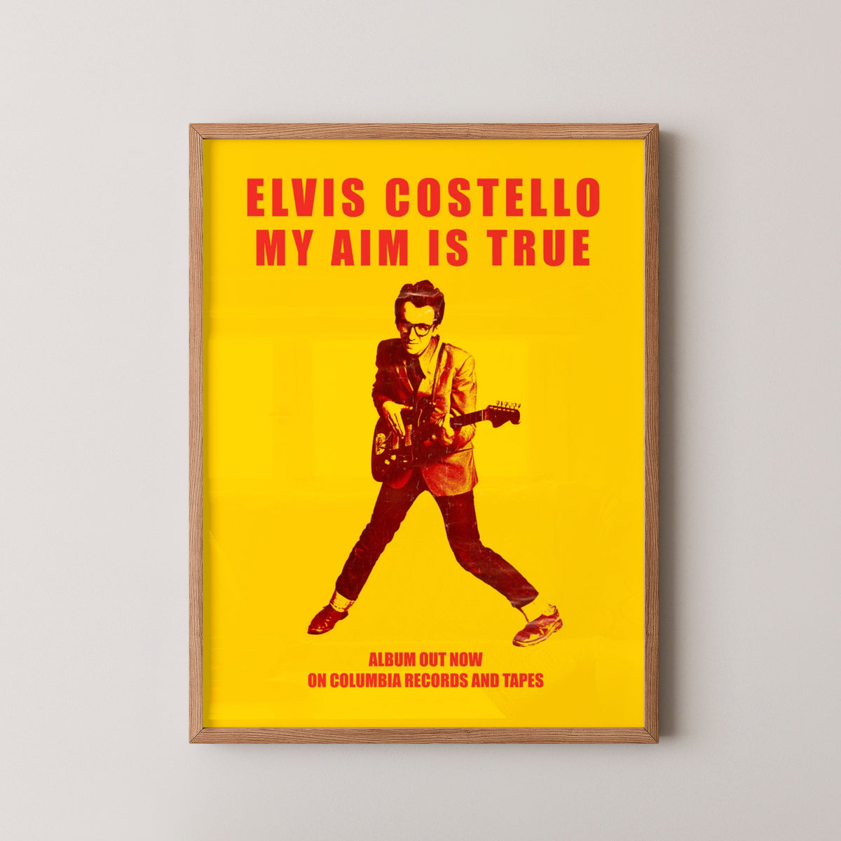 Elvis Costello Vintage Poster – New Wave Music Art – wood frame mockup