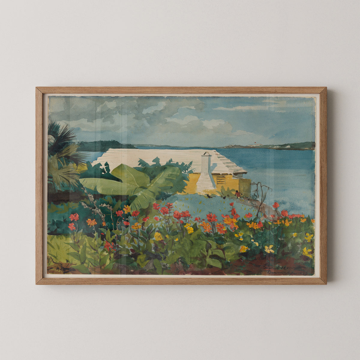 Natural wood-framed Homer print with red and yellow flowers, broad leaves and a white-roofed bungalow