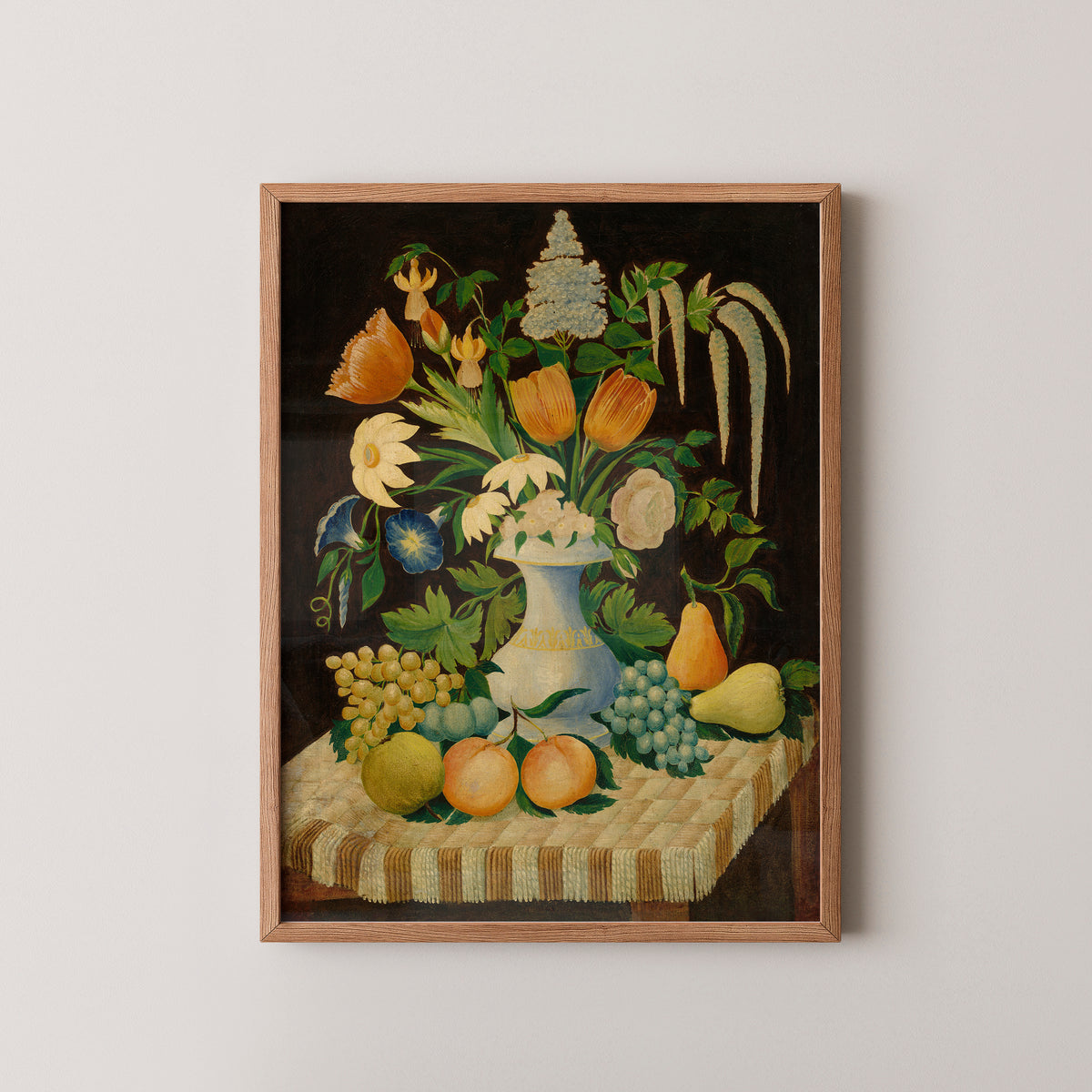 Natural wood-framed Flowers and Fruit art print, showing flowers, fruit and pale blue vase