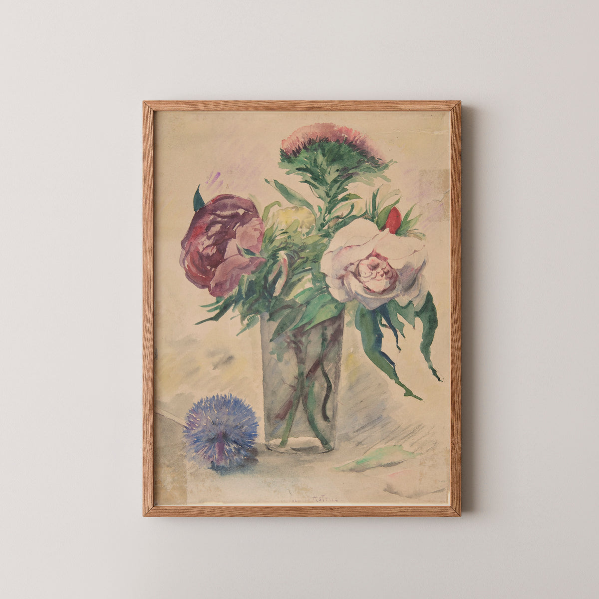 Natural wood-framed Astruc print with pink, red and white blossoms above layered green leaves