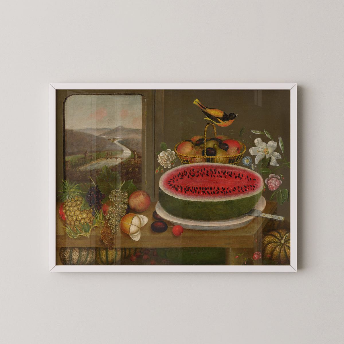 White-framed Wagguno still life with red watermelon, dark leaves and a landscape visible at the left