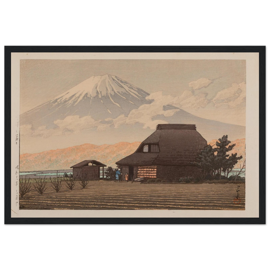 This fine reproduction of Mt. Fuji from Narusawa (Narusawa no Fuji, Showa 11 / 1936) showcases the breathtaking landscape vision of Kawase Hasui (1883–1957), a master of the Shin-Hanga movement. Signed by the artist and bearing his distinctive red ink seal, this peaceful scene of Mount Fuji rising behind the forests of Narusawa reflects Hasui’s talent for capturing Japan’s natural majesty with elegance and quiet emotion. Originally published by Watanabe Shōzaburō, whose seal is reproduced in this edition, t
