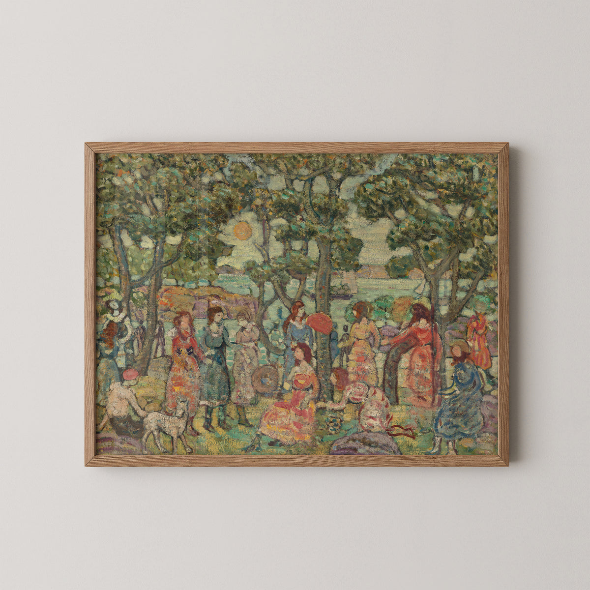 Natural wood-framed Prendergast print with coral, lilac and blue clothing beneath leafy trees