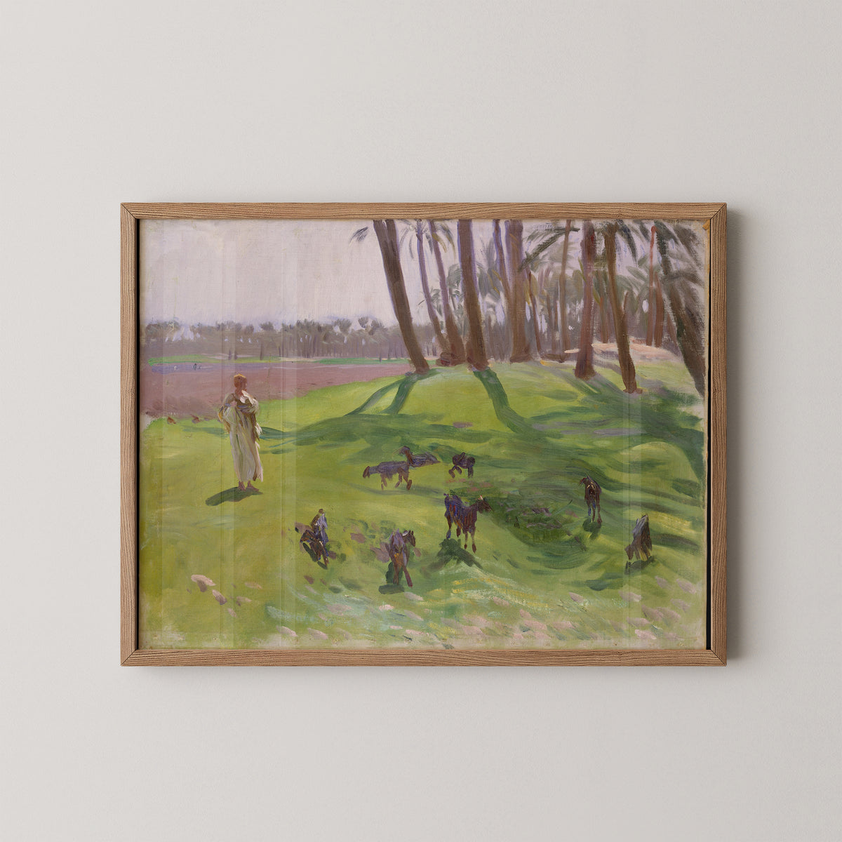 Natural wood-framed Sargent landscape with a standing goatherd, scattered goats and a green meadow
