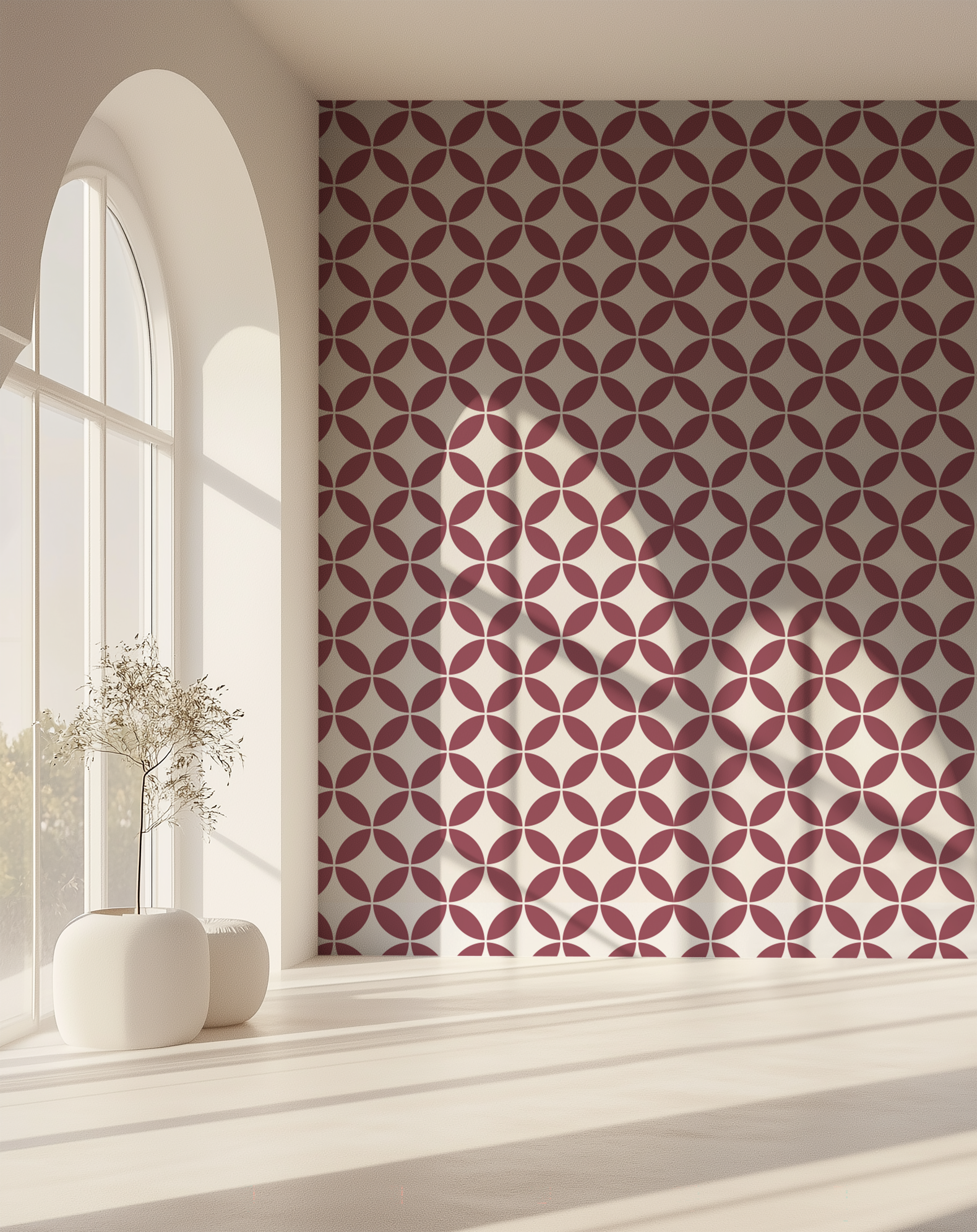 Burgundy geometric wallpaper with a retro circle pattern in a bright architectural interior