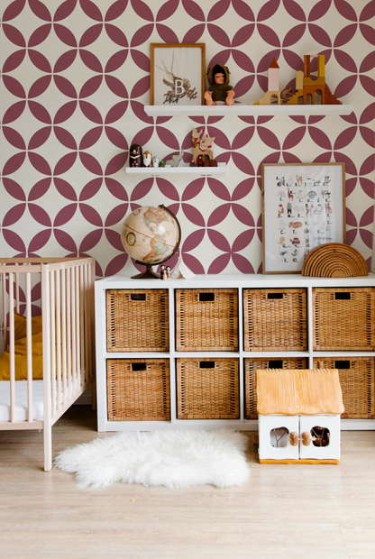 Burgundy and cream geometric wallpaper styled in a modern kids room