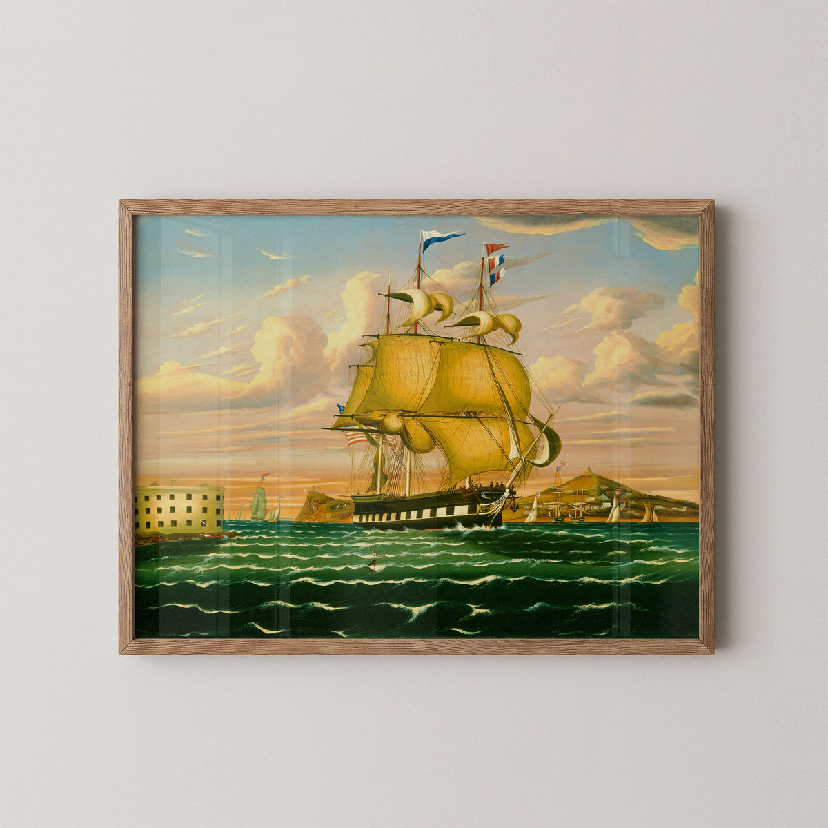 Natural wood-framed Thomas Chambers print of a packet ship passing Castle Williams in New York Harbor