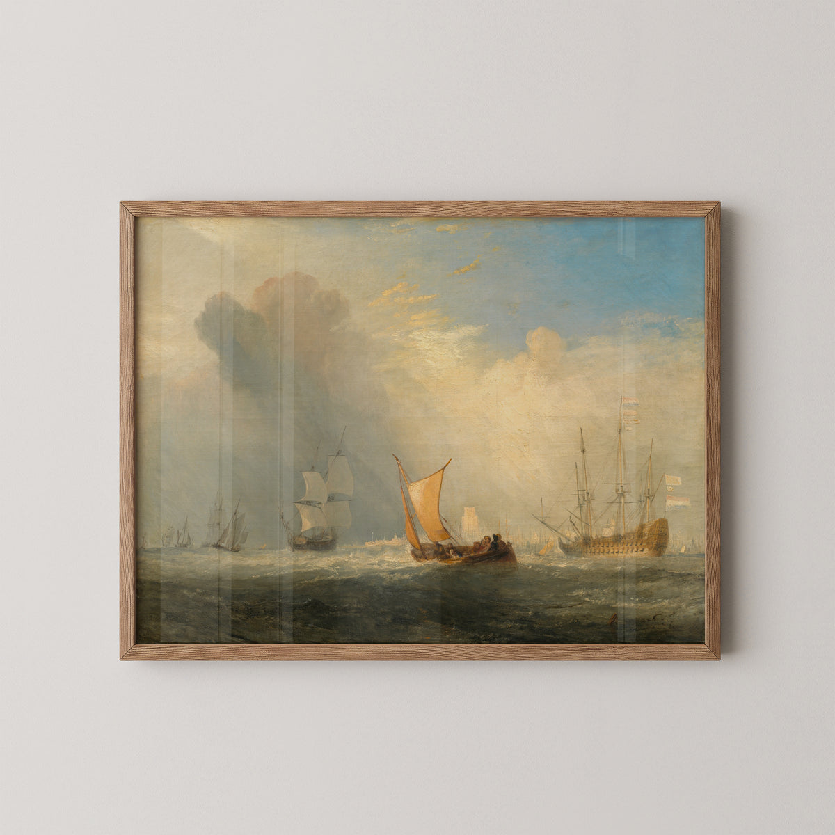 Natural wood-framed Turner print with sunlit tan sails and passengers crossing choppy harbor water