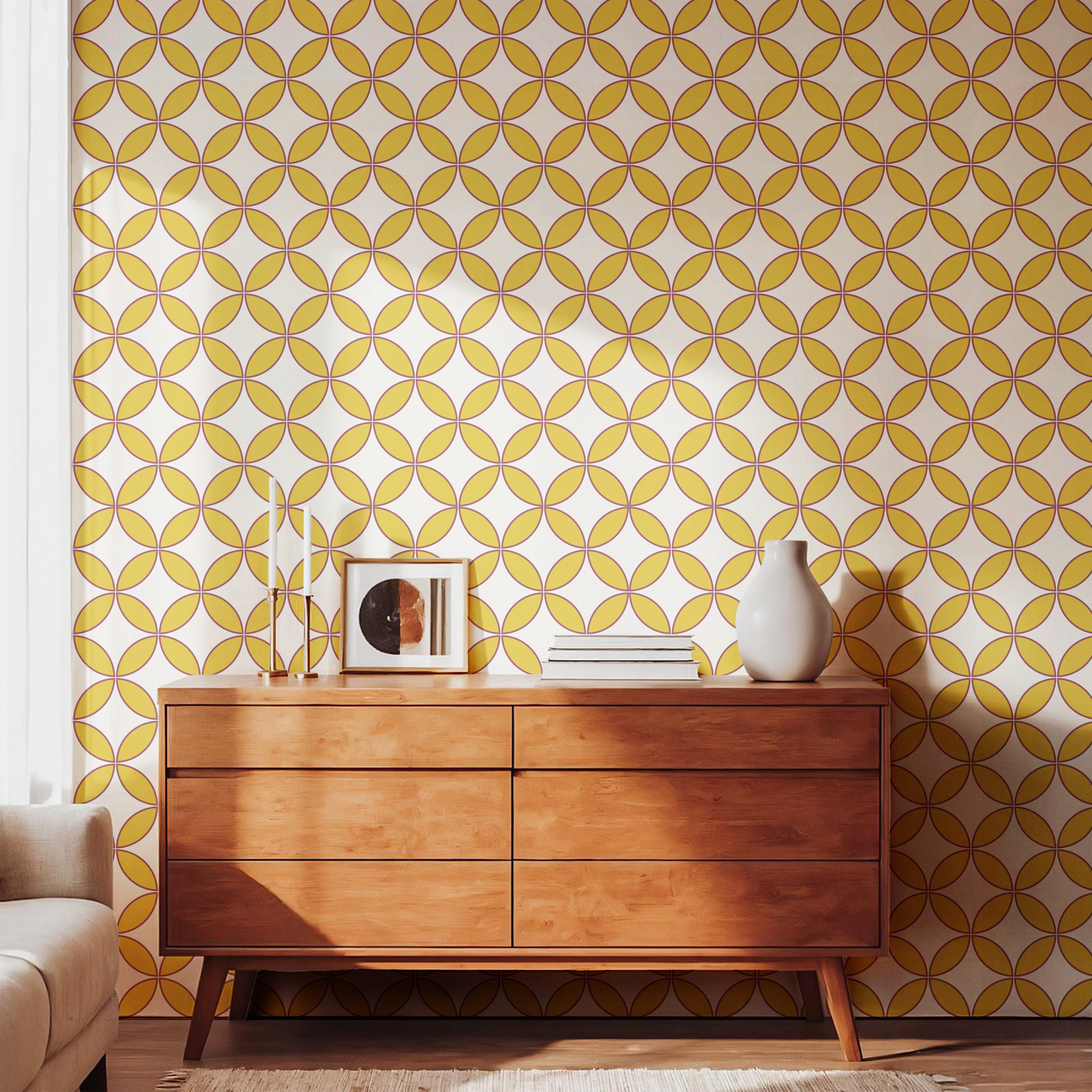 Mustard geometric pattern wallpaper styled with a warm wooden dresser