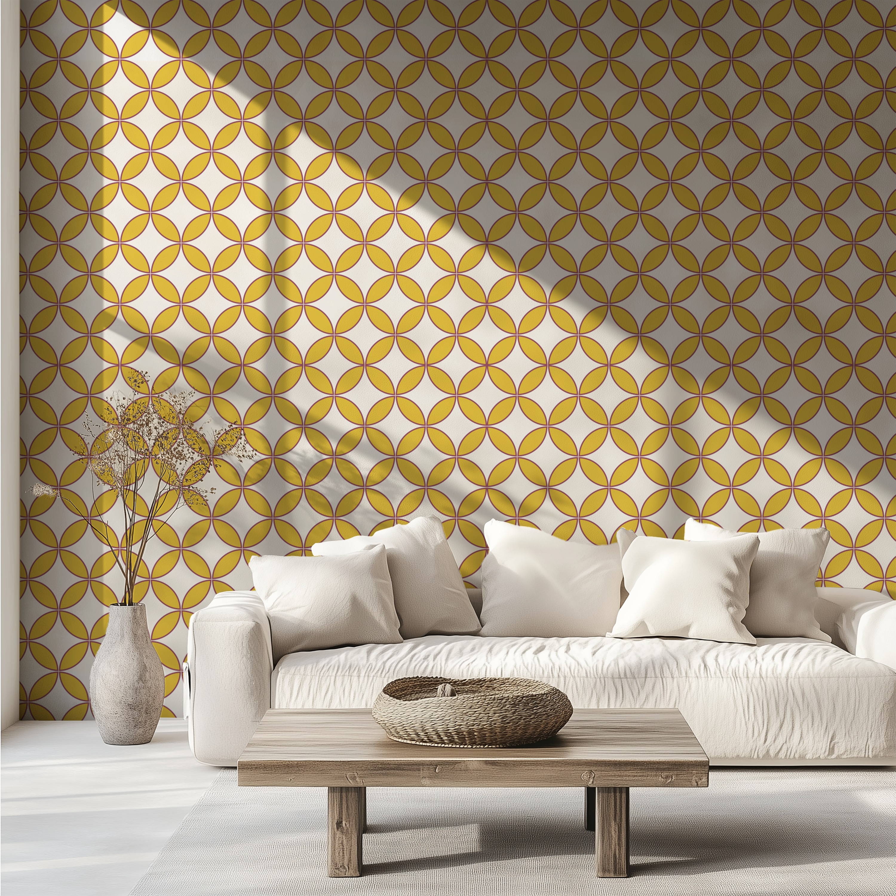 Mustard retro geometric wallpaper with interlocking circles behind a white sofa