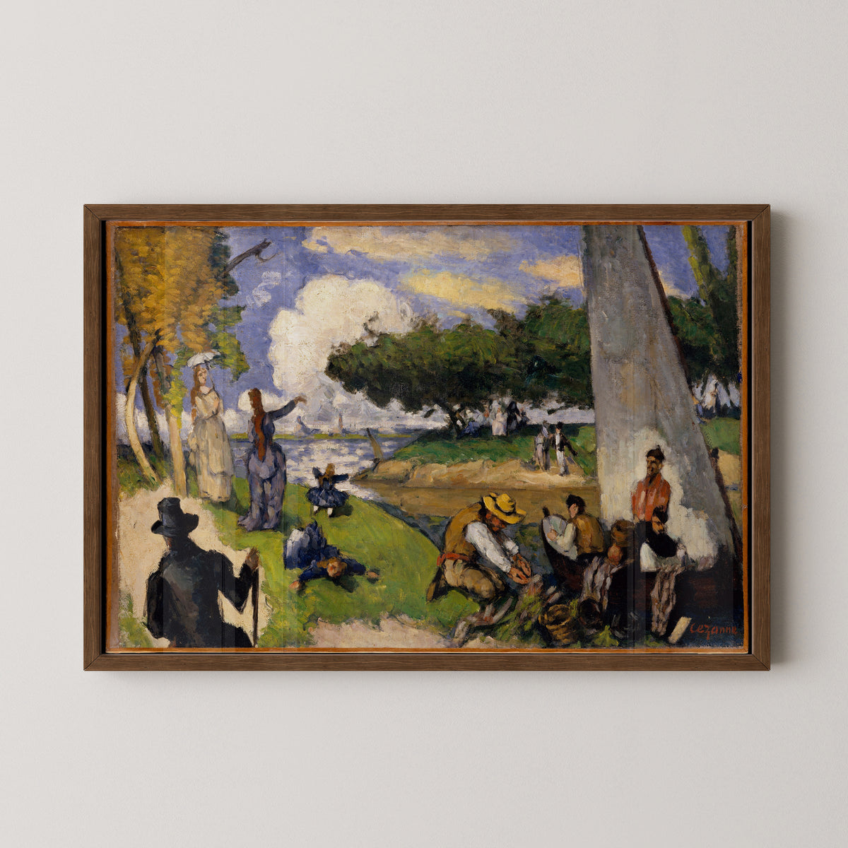 Dark wood-framed The Fishermen by Cézanne, with broad green trees and pale dresses along the shore