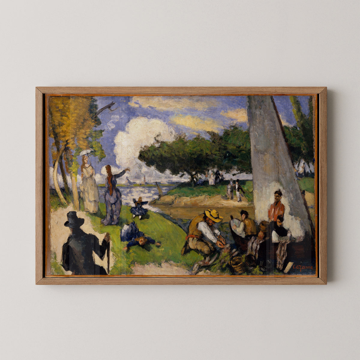 Natural wood-framed Cézanne print with fishing figures and elegant walkers beside sunlit water