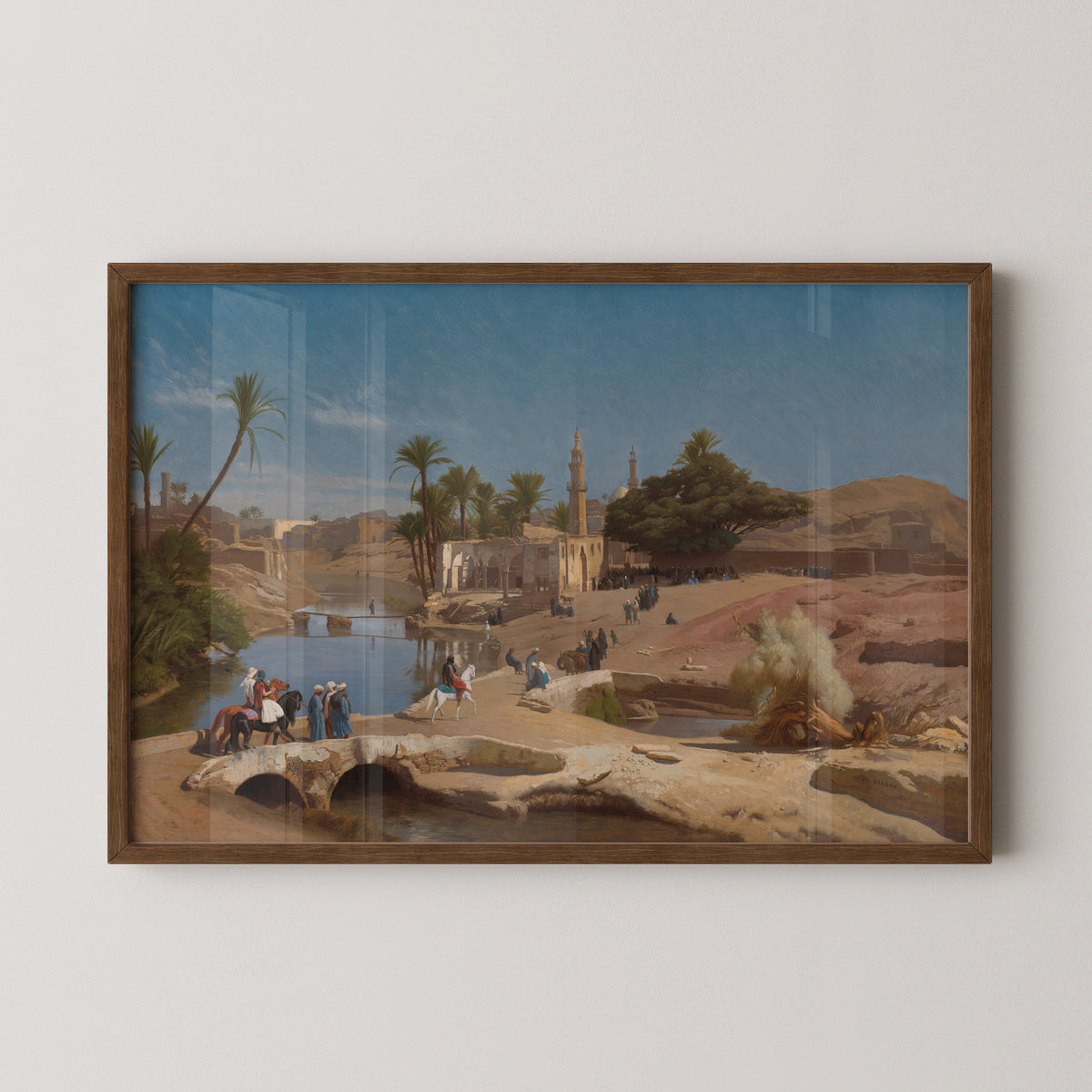 View of Medinet El-Fayoum by Jean-Léon Gérôme art print in a dark wood frame, with Egyptian landscape with palms and minarets