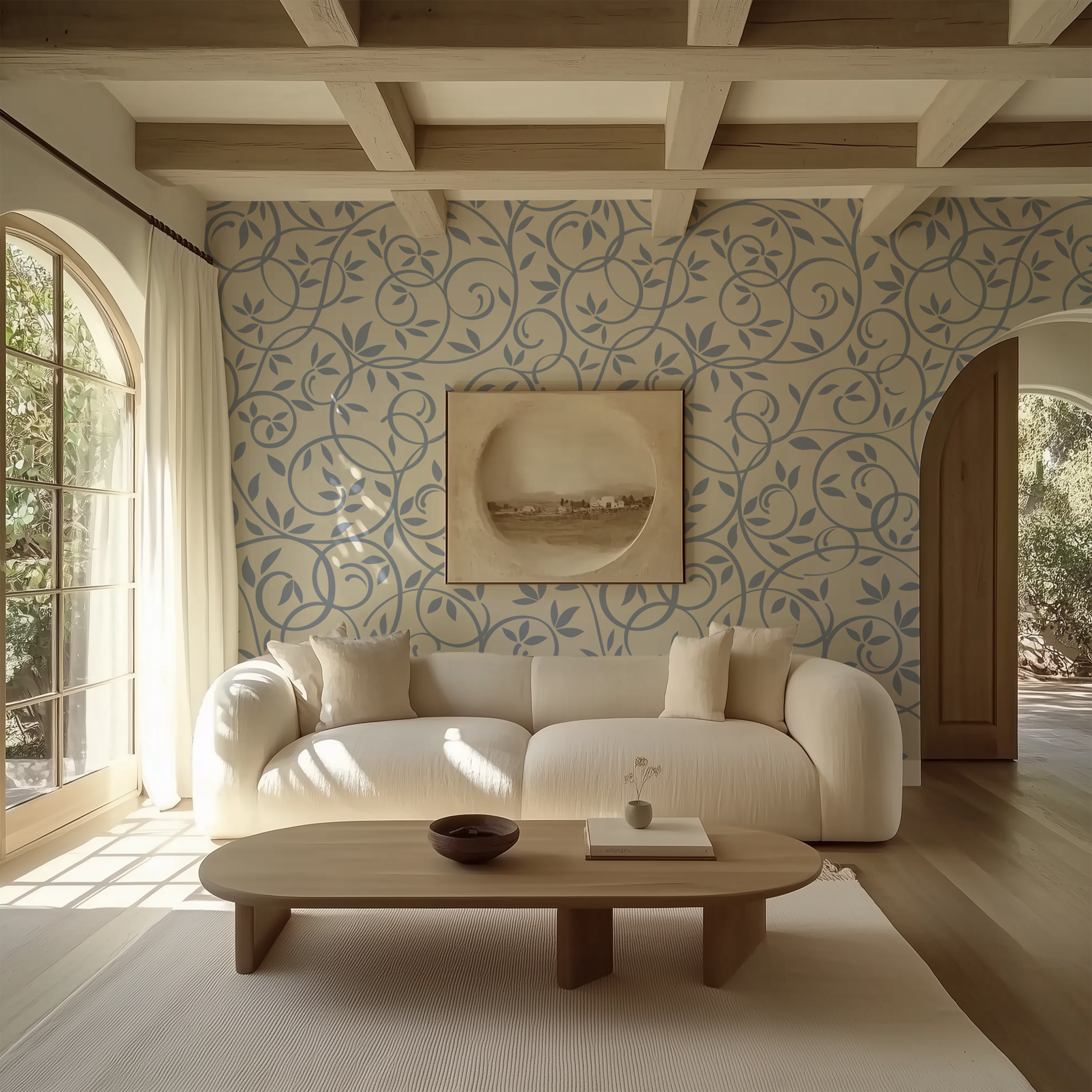 Dusty blue botanical vine wallpaper styled in a soft modern living room